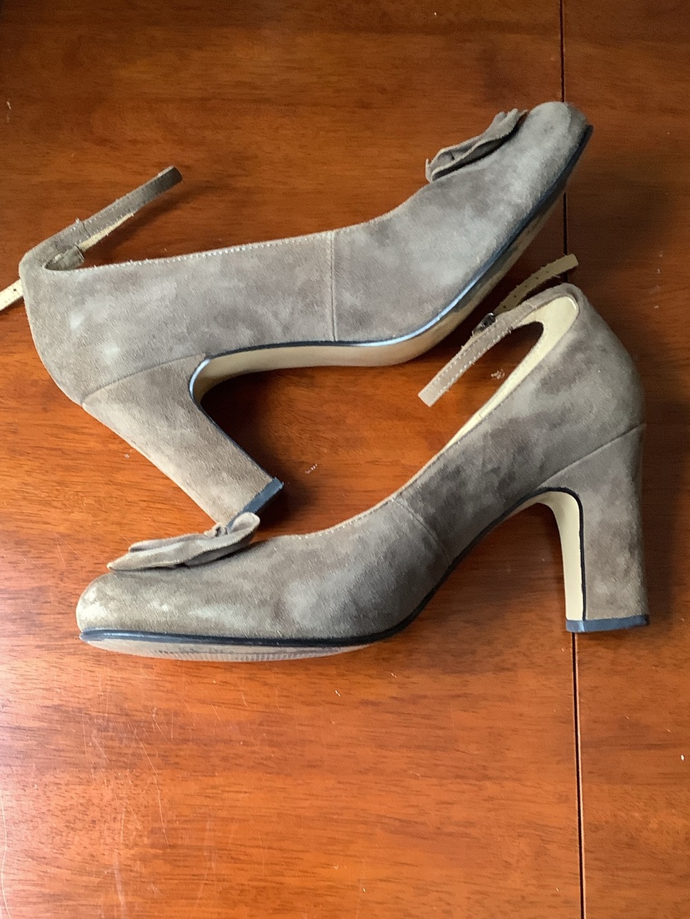 PAZZO Taupe Suede Ankle-Strap Pumps with Floral Rosette.